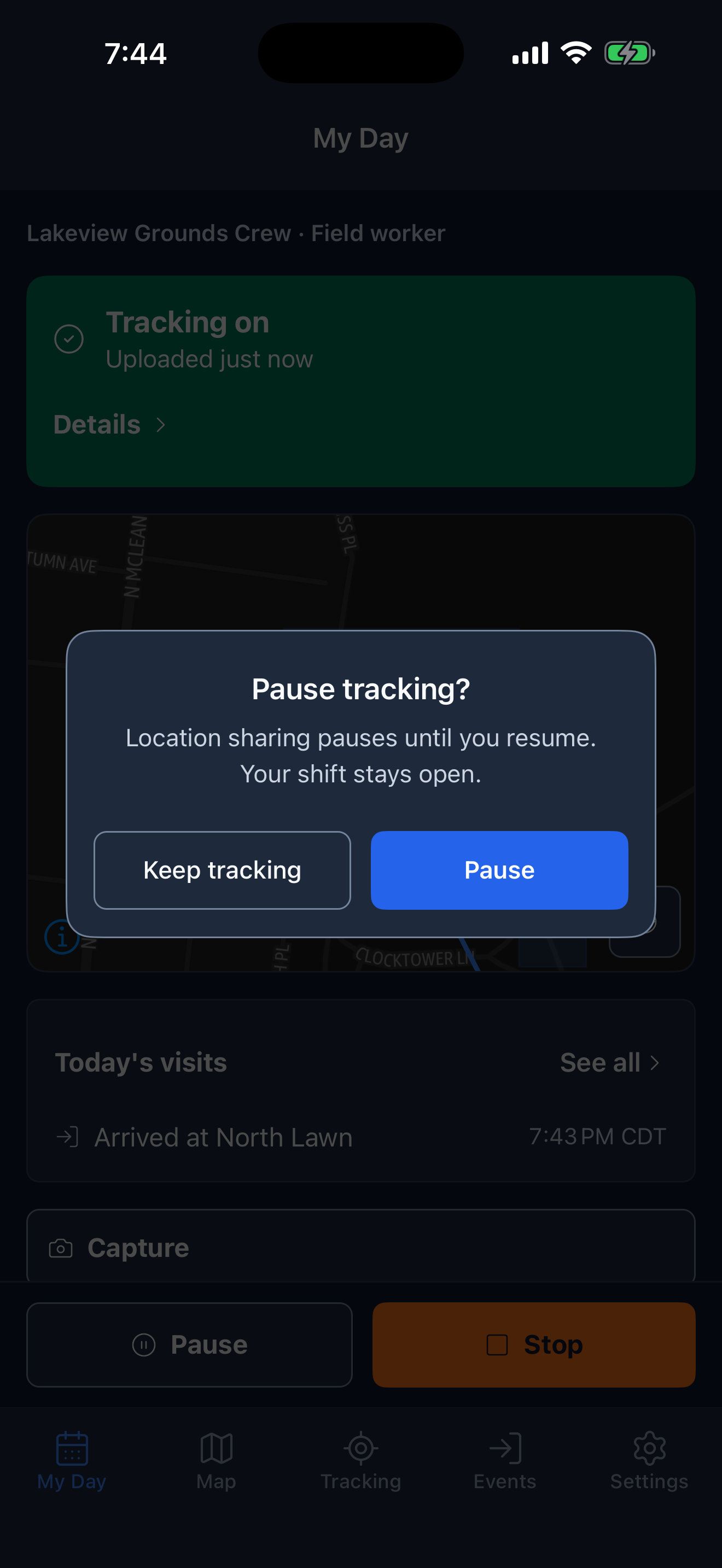 Pause tracking dialog saying location sharing pauses until you resume and the shift stays open, with Keep tracking and Pause buttons.